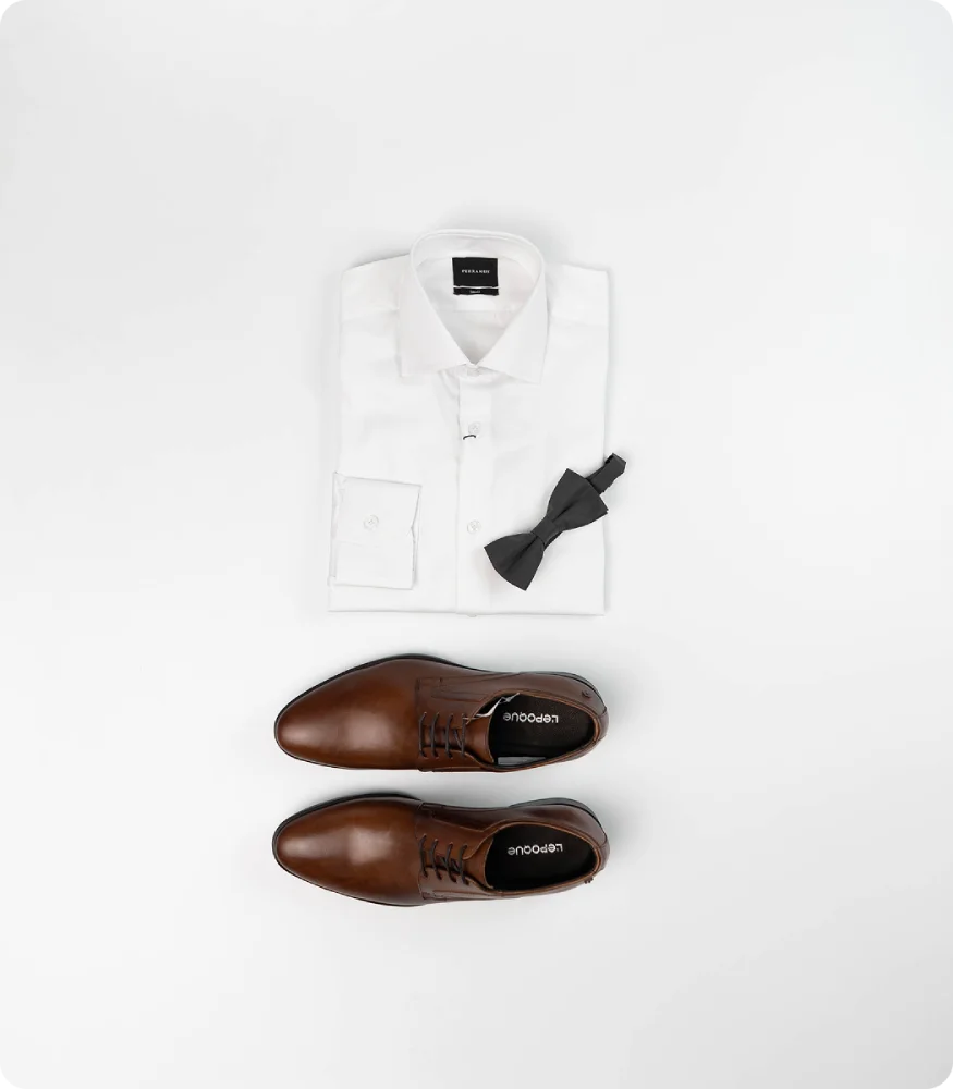 Detalle de puño y saco en sesión editorial